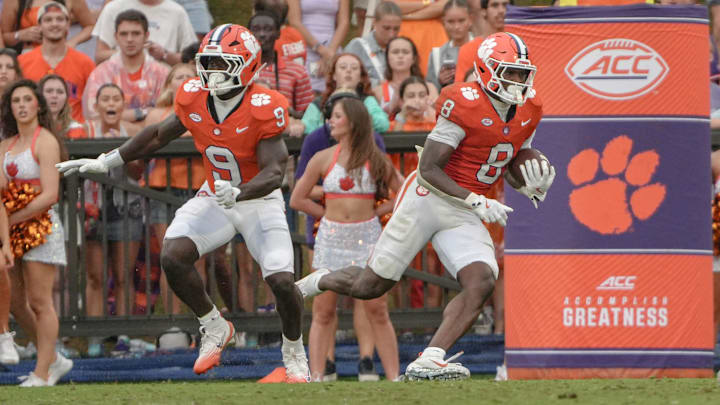 Clemson running back Adam Randall (8) returns a kickoff near running back Gideon Davidson (9) during the second quarter at Memorial Stadium in Clemson, S.C. Saturday, September 6, 2025.