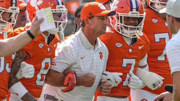Sep 20, 2025; Clemson, South Carolina, USA; Clemson Tigers head coach Dabo Swinney joins in the Walk of Champions march after pregame practice before their game against the Syracuse Orange in Memorial Stadium. Mandatory Credit: Ken  Ruinard/GREENVILLE NEWS-USA TODAY Network via Imagn Images