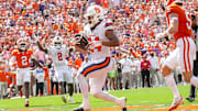Sep 20, 2025; Clemson, South Carolina, USA; Syracuse Orange running back Will Nixon (24) scores a touchdown agains the Clemson Tigers during the second quarter at Memorial Stadium. Mandatory Credit: Ken Ruinard/GREENVILLE NEWS-USA TODAY Network via Imagn Images