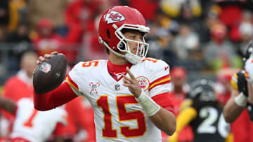 Dec 25, 2024; Pittsburgh, Pennsylvania, USA;  Kansas City Chiefs quarterback Patrick Mahomes (15) passes the ball against the Pittsburgh Steelers during the fourth quarter at Acrisure Stadium. Mandatory Credit: Charles LeClaire-Imagn Images