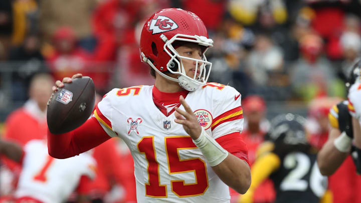 Dec 25, 2024; Pittsburgh, Pennsylvania, USA; Kansas City Chiefs quarterback Patrick Mahomes (15) passes the ball against the Pittsburgh Steelers during the fourth quarter at Acrisure Stadium. Mandatory Credit: Charles LeClaire-Imagn Images