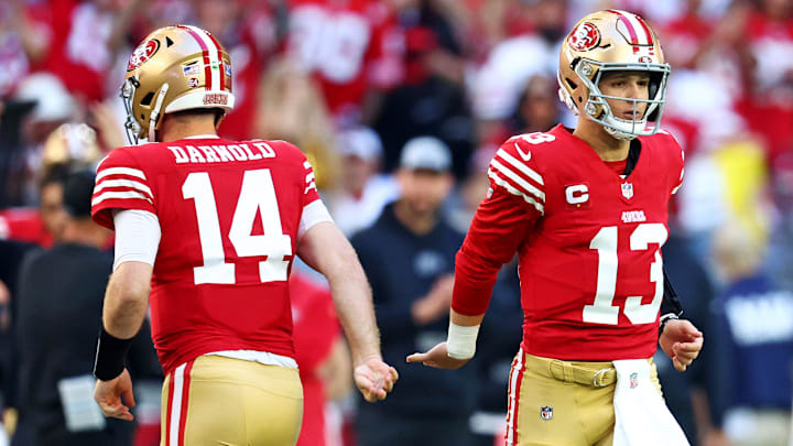 San Francisco 49ers quarterback Brock Purdy (13) greets quarterback Sam Darnold. San Francisco 49ers quarterback Brock Purdy (13) greets quarterback Sam Darnold.