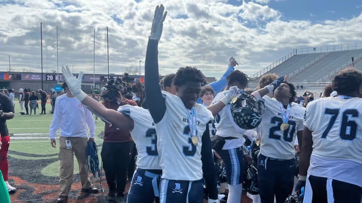 Berkeley Prep junior athlete Dallas Golden celebrates the Buccaneers upset of nationally ranked Norland on Saturday at Bragg Memorial Stadium.