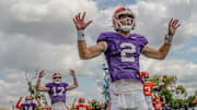 Clemson quarterback Cade Klubnik (2) and teammates warm up with “Tiger Jacks” exercise during Clemson football 2025 practice at Jersey Meadowsin Clemson, S.C. Thursday, August 6, 2025.