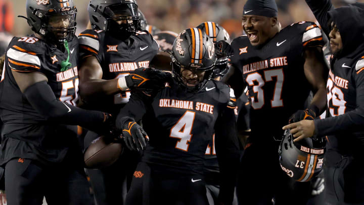 Oklahoma State's Nickolas Martin (4) celebrates an interception in the fourth quarter of the college football game between the Oklahoma State University Cowboys and the Kansas State Wildcats at Boone Pickens Stadium in Stillwater. Okla., Friday, Oct. 6, 2023. OSU won 29-21.