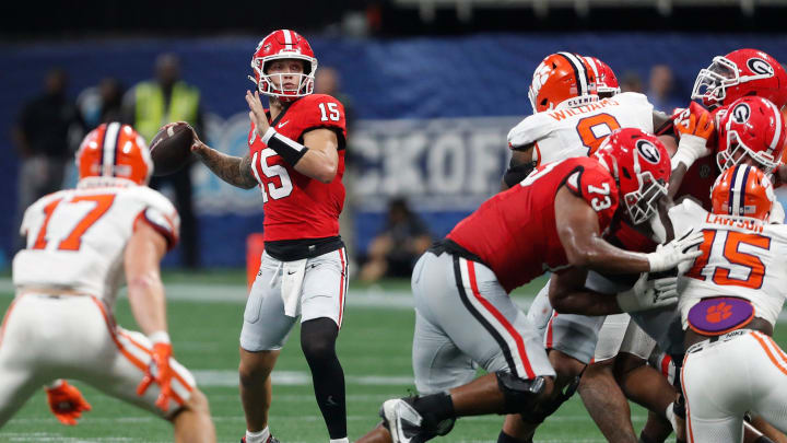 Georgia quarterback Carson Beck (15) looks to throw the ball during the second half of the NCAA Aflac Kickoff Game against Clemson in Atlanta, on Saturday, Aug. 31, 2024.