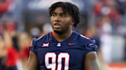 Nov 8, 2025; Tucson, Arizona, USA; Arizona Wildcats defensive lineman Chancellor Owens (90) against the Kansas Jayhawks at Arizona Stadium. Mandatory Credit: Mark J. Rebilas-Imagn Images