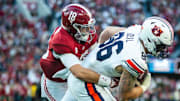Nov 30, 2024; Tuscaloosa, Alabama, USA; Alabama Crimson Tide defensive back Bray Hubbard (18) grabs onto Auburn Tigers tight end Luke Deal (86) during the second quarter at Bryant-Denny Stadium. Mandatory Credit: Will McLelland-Imagn Images