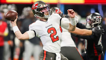 Jan 8, 2023; Atlanta, Georgia, USA; Tampa Bay Buccaneers quarterback Kyle Trask (2) throws a pass against the Atlanta Falcons in the second half at Mercedes-Benz Stadium.