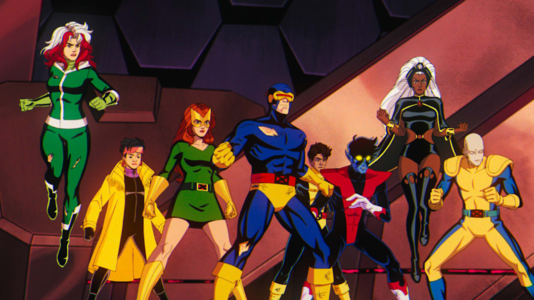 (L-R): Rogue (voiced by Lenore Zann), Jubilee (voiced by Holly Chou), Jean Grey (voiced by Jennifer Hale), Cyclops (voiced by Ray Chase), Roberto Da Costa (voiced by Gui Agustini), Nightcrawler (voiced by Adrian Hough), Storm (voiced by Alison Sealy-Smith), and Morph (voiced by JP Karliak) in Marvel Animation's X-MEN '97. Photo courtesy of Marvel Animation. © 2024 MARVEL.