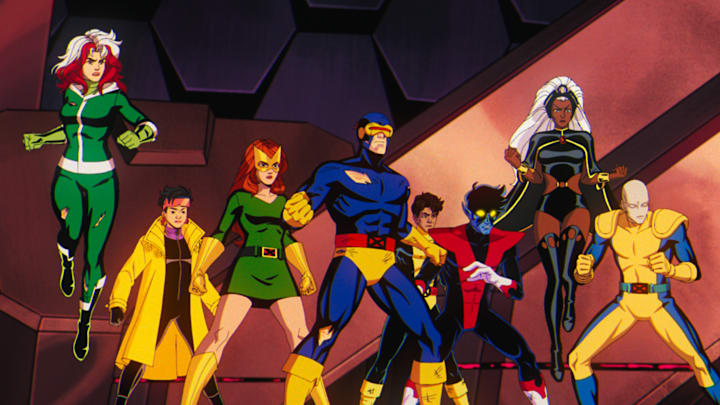 (L-R): Rogue (voiced by Lenore Zann), Jubilee (voiced by Holly Chou), Jean Grey (voiced by Jennifer Hale), Cyclops (voiced by Ray Chase), Roberto Da Costa (voiced by Gui Agustini), Nightcrawler (voiced by Adrian Hough), Storm (voiced by Alison Sealy-Smith), and Morph (voiced by JP Karliak) in Marvel Animation's X-MEN '97. 