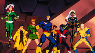 (L-R): Rogue (voiced by Lenore Zann), Jubilee (voiced by Holly Chou), Jean Grey (voiced by Jennifer Hale), Cyclops (voiced by Ray Chase), Roberto Da Costa (voiced by Gui Agustini), Nightcrawler (voiced by Adrian Hough), Storm (voiced by Alison Sealy-Smith), and Morph (voiced by JP Karliak) in Marvel Animation's X-MEN '97. Photo courtesy of Marvel Animation. © 2024 MARVEL.