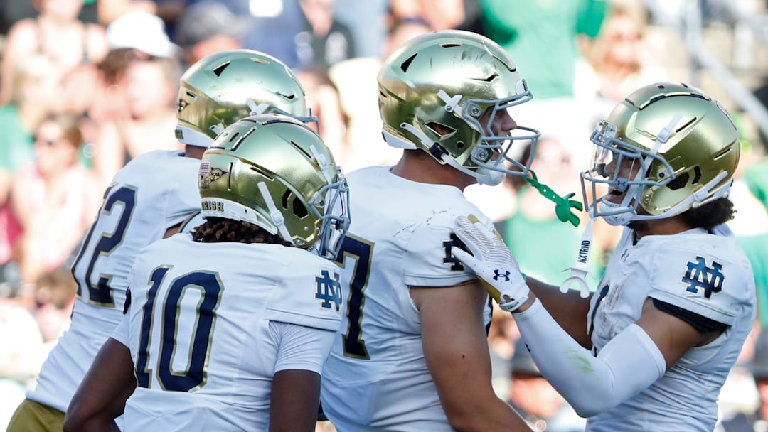 Notre Dame Fighting Irish tight end Cooper Flanagan (87) celebrates with teammates after scoring a touchdown Saturday, Sept. 14, 2024, during the NCAA football game against the Purdue Boilermakers at Ross-Ade Stadium in West Lafayette, Ind. Notre Dame Fighting Irish won 66-7.