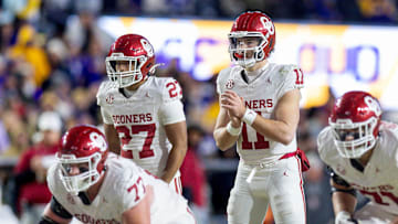 Nov 30, 2024; Baton Rouge, Louisiana, USA;  Oklahoma Sooners quarterback Jackson Arnold (11) calls for the ball against the LSU Tigers during the second quarter at Tiger Stadium. Mandatory Credit: Stephen Lew-Imagn Images