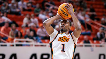 Feb 25, 2025; Stillwater, Oklahoma, USA; Oklahoma State Cowboys guard Bryce Thompson (1) shoots the ball during the first half against the Iowa State Cyclones at Gallagher-Iba Arena. Mandatory Credit: William Purnell-Imagn Images