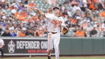 May 4, 2025; Baltimore, Maryland, USA; Baltimore Orioles third baseman Coby Mayo (16) throws out Kansas City Royals right fielder Hunter Renfroe (16) (not pictured) after fielding a ground ball during the eighth inning at Oriole Park at Camden Yards. 