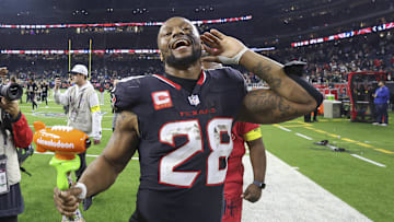 Jan 11, 2025; Houston, Texas, USA; Houston Texans running back Joe Mixon (28) reacts after the game against the Los Angeles Chargers in an AFC wild card game at NRG Stadium. Mandatory Credit: Troy Taormina-Imagn Images