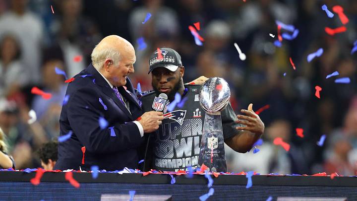 Feb 5, 2017; Houston, TX, USA; New England Patriots running back James White (right) is interviewed by Terry Bradshaw as celebrates with the Vince Lombardi trophy after defeating the Atlanta Falcons during Super Bowl LI at NRG Stadium. Mandatory Credit: Mark J. Rebilas-Imagn Images