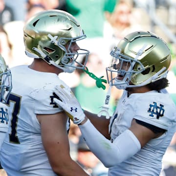 Notre Dame Fighting Irish tight end Cooper Flanagan (87) celebrates with teammates after scoring a touchdown Saturday, Sept. 14, 2024, during the NCAA football game against the Purdue Boilermakers at Ross-Ade Stadium in West Lafayette, Ind. Notre Dame Fighting Irish won 66-7.