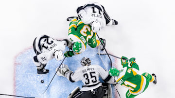 Mar 17, 2025; Saint Paul, Minnesota, USA;  Los Angeles Kings goaltender Darcy Kuemper (35) makes a save against the Minnesota Wild center Marco Rossi (23) in the third period at Xcel Energy Center.