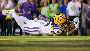 Oct 21, 2023; Baton Rouge, Louisiana, USA; LSU Tigers running back John Emery Jr. (4) is ruled just short of the end zone against the Army Black Knights during the second quarter at Tiger Stadium. Mandatory Credit: Matthew Hinton-USA TODAY Sports