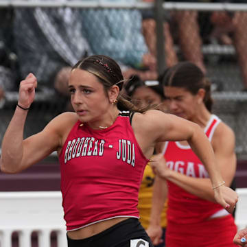 Catholic Memorial's Analena Peterson (5) wins the Division 2 girls 100-meter dash during the WIAA State Track and Field meet on Saturday, June 7, 2025 at Veterans Memorial Field in La Crosse, Wis.
