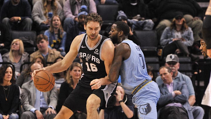 Jan 9, 2019; Memphis, TN, USA; Memphis Grizzlies forward JaMychal Green (0) guards San Antonio Spurs center Pau Gasol (16) during the first half at FedExForum.