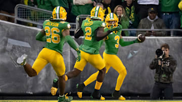 Oregon defensive back Brandon Johnson celebrates a defensive touchdown after a fumble forced by Oregon defensive end Jordan Burch as the Oregon Ducks host the Maryland Terrapins at Autzen Stadium Saturday, Nov. 9, 2024, in Eugene, Ore.