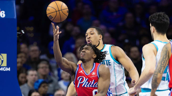 Mar 1, 2024; Philadelphia, Pennsylvania, USA; Philadelphia 76ers guard Tyrese Maxey (0) drives for a shot past Charlotte Hornets forward Grant Williams (2) during the third quarter at Wells Fargo Center. Mandatory Credit: Bill Streicher-USA TODAY Sports