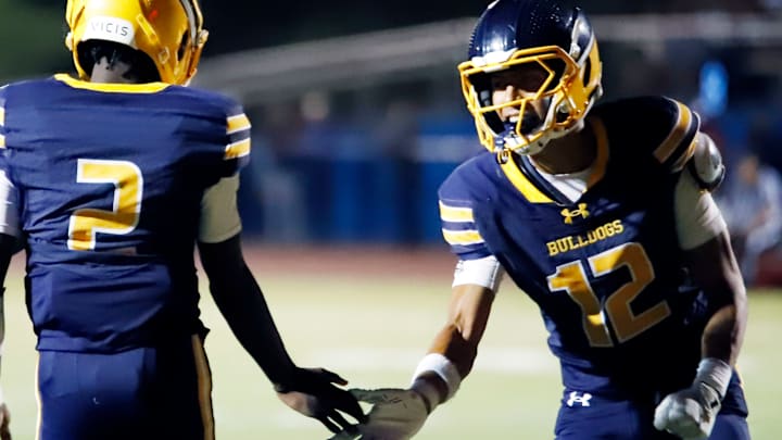 Shady Side Academy wide receiver Nico Grzymkowski, right, high-fives quarterback Javon Johnston during a 56-26 win over Burrell last Friday. The Bulldogs chose to forfeit their game against Clairton this Friday due to a lack of healthy players. Shady Side Academy wide receiver Nico Grzymkowski, right, high-fives quarterback Javon Johnston during a 56-26 win over Burrell last Friday. The Bulldogs chose to forfeit their game against Clairton this Friday due to a lack of healthy players.