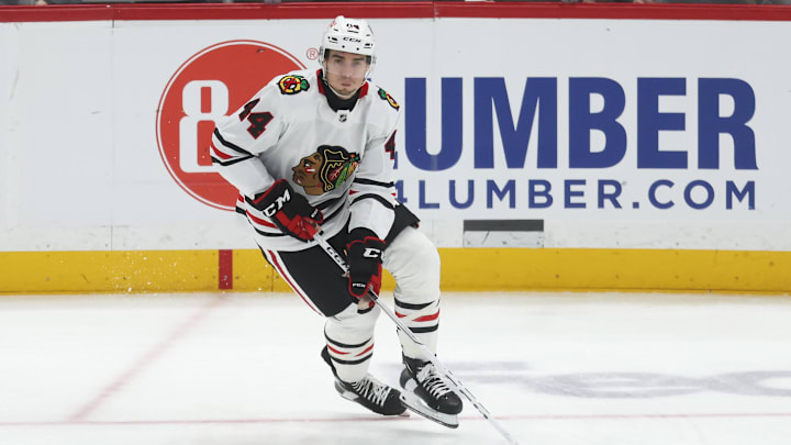 Apr 8, 2025; Pittsburgh, Pennsylvania, USA;  Chicago Blackhawks defenseman Wyatt Kaiser (44) skates with the puck against the Pittsburgh Penguins during the second period at PPG Paints Arena. Mandatory Credit: Charles LeClaire-Imagn Images