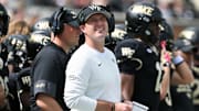 Sep 27, 2025; Winston-Salem, North Carolina, USA; Wake Forest Demon Deacons head coach Jake Dickert during the third quarter against the Georgia Tech Yellow Jackets at Allegacy Federal Credit Union Stadium. Mandatory Credit: Zachary Taft-Imagn Images