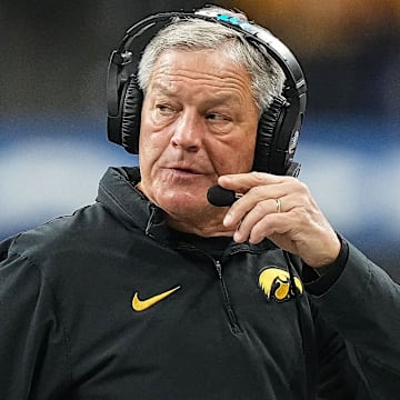 Iowa Hawkeyes head coach Kirk Ferentz walks off the field during a timeout Saturday, Dec. 2, 2023, during the game at Lucas Oil Stadium in Indianapolis.