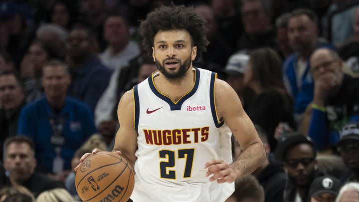 Apr 30, 2026; Minneapolis, Minnesota, USA; Denver Nuggets guard Jamal Murray (27) dribbles the ball against the Minnesota Timberwolves in the second half during game six of the first round of the 2026 NBA Playoffs at Target Center. Mandatory Credit: Jesse Johnson-Imagn Images