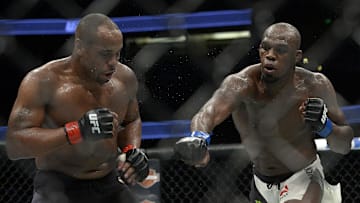 Jon Jones lands a hit against Daniel Cormier during UFC 214 at Honda Center. 