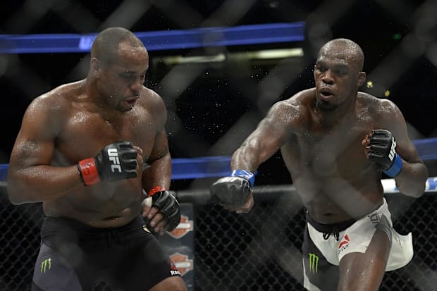 Jon Jones lands a hit against Daniel Cormier during UFC 214 at Honda Center. 
