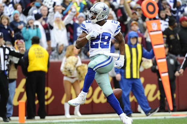 Dallas Cowboys running back DeMarco Murray celebrates after scoring a touchdown against Washington.