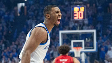 Kentucky Wildcats guard Lamont Butler (1) celebrates after a play during their game against the Louisville Cardinals on Saturday, Dec. 14, 2024 at Rupp Arena in Lexington, Ky.