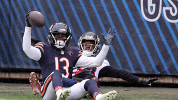 Dec 31, 2023; Chicago, Illinois, USA; Chicago Bears wide receiver Tyler Scott (13) reacts after making a touchdown catch that was called out of bounds against the Atlanta Falcons during the second half at Soldier Field. Mandatory Credit: Mike Dinovo-USA TODAY Sports