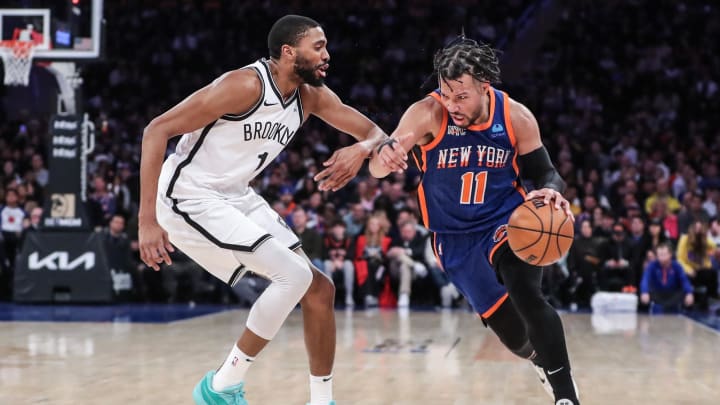 Mar 23, 2024; New York, New York, USA;  New York Knicks guard Jalen Brunson (11) drives past Brooklyn Nets forward Mikal Bridges (1) in the third quarter at Madison Square Garden. Mandatory Credit: Wendell Cruz-USA TODAY Sports