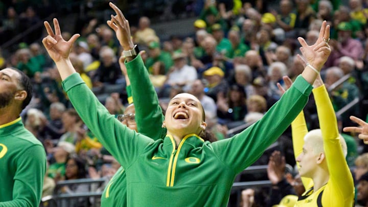 Oregon Coordinator of Player Engagement and Operations Peyton Scott celebrates with the Ducks as the Oregon Ducks host the Penn State Nittany Lions on Jan. 24, 2026, at Matthew Knight Arena in Eugene, Oregon.