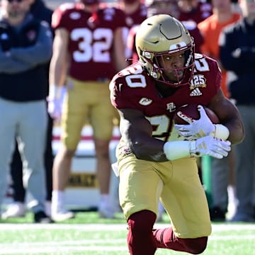 Nov 11, 2023; Chestnut Hill, Massachusetts, USA; Boston College Eagles running back Alex Broome (20) runs the ball against the Virginia Tech Hokies during the first half at Alumni Stadium. Mandatory Credit: Eric Canha-Imagn Images