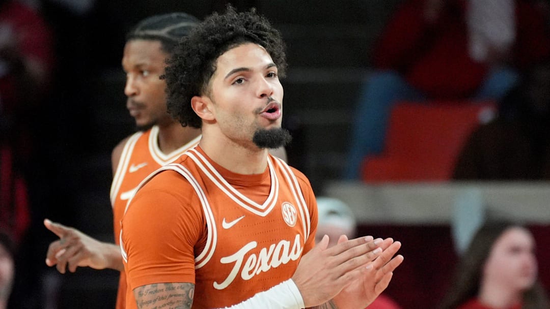 Texas' Chendall Weaver (2) celebrates in the second half of the men's college basketball game between the Oklahoma Sooners and the Texas Longhorns at Lloyd Noble Center in Norman, Okla., Saturday Jan. 31, 2026. Texas' Chendall Weaver (2) celebrates in the second half of the men's college basketball game between the Oklahoma Sooners and the Texas Longhorns at Lloyd Noble Center in Norman, Okla., Saturday Jan. 31, 2026.