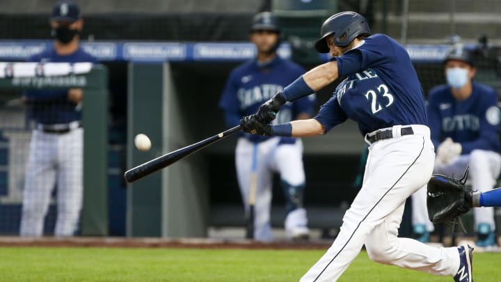 Then-Seattle Mariners catcher Austin Nola hits a home run against the Los Angeles Dodgers on Aug. 19, 2020, at T-Mobile Park.