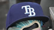 Sep 26, 2025; Toronto, Ontario, CAN; The hat and glove of Tampa Bay Rays third baseman Junior Caminero (13) in the dugout during the game against the Toronto Blue Jays at Rogers Centre. 