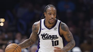 Nov 19, 2025; Oklahoma City, Oklahoma, USA; Sacramento Kings guard DeMar DeRozan (10) dribbles down the court against the Oklahoma City Thunder during the second quarter at Paycom Center.