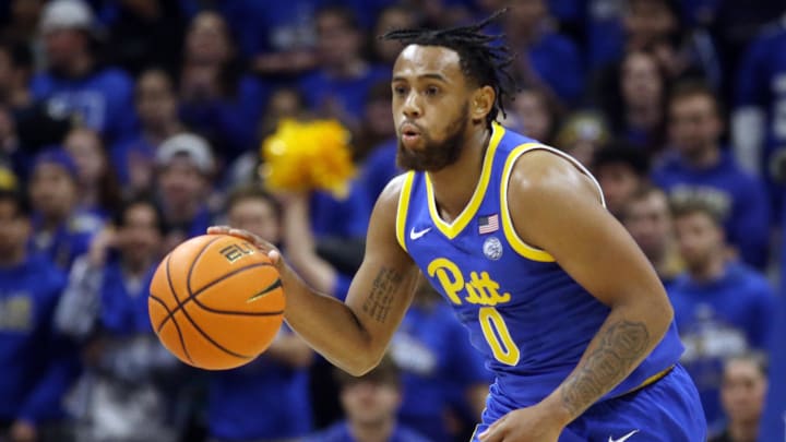 Jan 21, 2023; Pittsburgh, Pennsylvania, USA;  Pittsburgh Panthers guard Nelly Cummings (0) brings the ball up court against the Florida State Seminoles during the second half at the Petersen Events Center. The Seminoles won 71-64. Mandatory Credit: Charles LeClaire-USA TODAY Sports