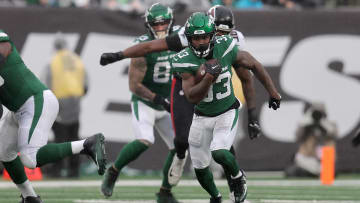 Dec 3, 2023; East Rutherford, New Jersey, USA; New York Jets running back Dalvin Cook (33) runs with the ball against the Atlanta Falcons during the first quarter at MetLife Stadium. Mandatory Credit: Brad Penner-USA TODAY Sports