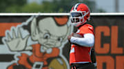 Browns quarterback Shedeur Sanders celebrates after breaking away for a big gain during practice.