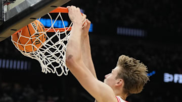 Mar 21, 2025; Seattle, WA, USA; Arizona Wildcats forward Henri Veesaar (13) dunks the ball against the Akron Zips during the second half in the first round of the NCAA Tournament at Climate Pledge Arena. Mandatory Credit: Stephen Brashear-Imagn Images